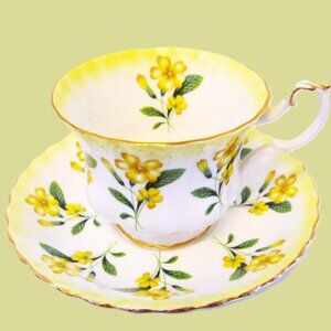 Royal Albert Yellow Primrose pattern with greenery gold edged teacup and saucer